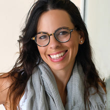 women wearing tortoise round reading glasses